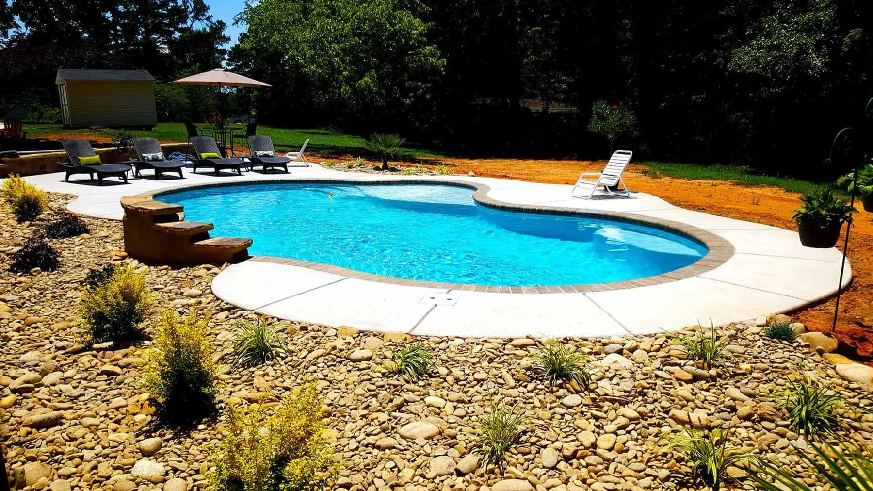 A custom concrete pool built by CPC Pools
